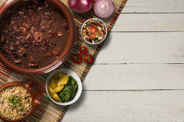 Wall Mural - Brazilian Feijoada Food. Top view with copy space.