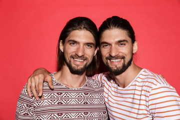 Portrait of a two young confident twin brothers