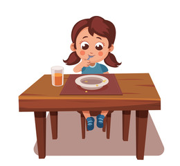 girl ate all the food. tasty meal, good appetite. child sits at table and eats. licking the spoon, empty plate