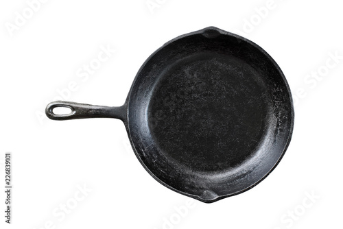 Fotomural Old black cast iron pan isolated over a white background with clipping path included