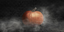 Halloween Pumpkin On A Dark Background With Smoke And Fog At Night