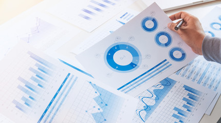 Fototapete - businessman working data document graph chart report marketing research development  planning management strategy analysis financial accounting. Business  office concept.