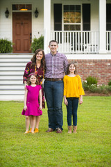 Wall Mural - Family of Four Outside their New Construction Home