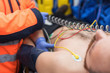 © herraez - Emergency doctor checking blood pressure of a patient in the ambulance