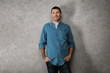 © Africa Studio - Young man in casual clothes on grey background