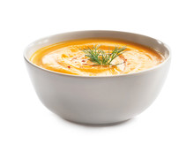 Delicious Pumpkin Cream Soup In Bowl On White Background