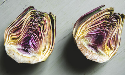 Poster - Fresh hearts of artichoke on the table