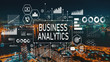 © Tierney - Business Analytics with aerial view of  city skylines at night