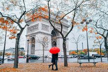 Couple In Paris Under Umbrella 