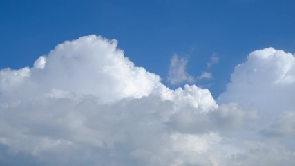 Wall Mural - time-lapse scene of beautiful clouds on blue sky.