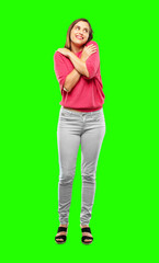 Poster - young woman full body. with a proud, confident and happy look, smiling and feeling satisfied, lateral or side view.