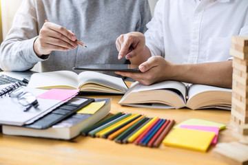 Wall Mural - education, teaching, learning concept. high school students or classmates group tutor in library stu