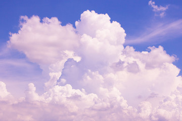 Clear blue sky with white cloud in daytime, space for text on background.