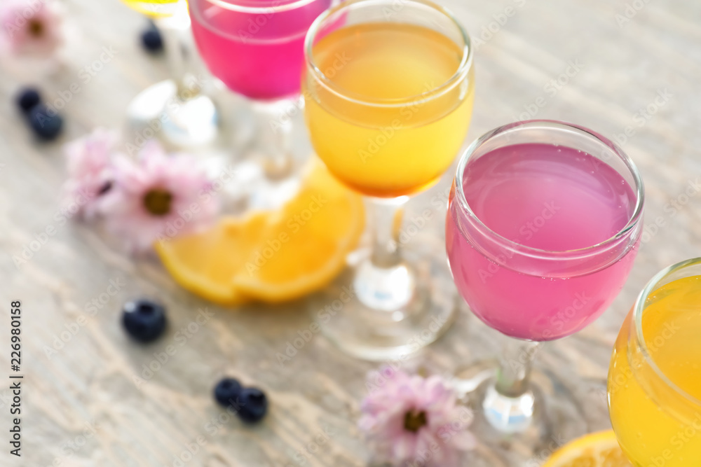 Glasses with delicious summer cocktails on table