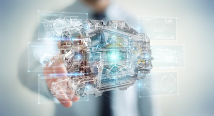 Poster - businessman using wireframe holographic 3d digital projection of an engine