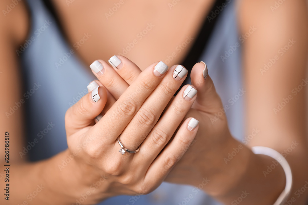 Woman with stylish beautiful manicure, closeup