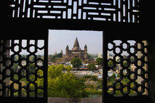 View From A Carved Window Of Raj Mahal. Chaturbhuj Temple Is Seen In The Distance. Orchha. Madhya Pradesh.