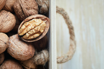 Closeup of whole and kernel walnuts. Top view with copy space