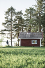 Finland, Kuopio, Mother With Daughter At A Cottage By The Lakeside In The Countryside