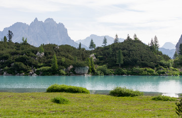 Detail shot of the wonderfull Sorapiss lake in the italian Alps, in the Dolomites mountains range close to Cortina in Veneto region, a unique place. The water of the lake is so blue it seems unreal