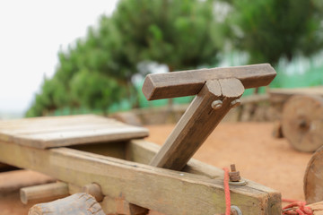 Tribe traditional wooden toy car, Toy of hill tribe in northern Thailand with blur background.