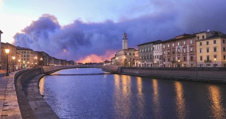 Wall Mural - Ponte di Mezzo bridge over Arno river and Clock tower at dusk in Pisa, Italy
