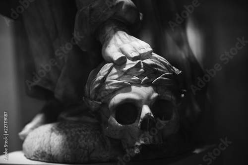 Man Stands On The Human Skull As Christian Symbol Of Victory - 