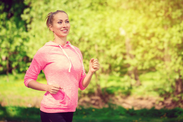 Wall Mural - fitness woman training and jogging in summer park