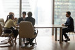 © fizkes - Diverse recruiters discuss male applicant candidature for job vacancy during interview in modern office, worried man candidate wait for employer decision at hiring. Employment, recruitment concept