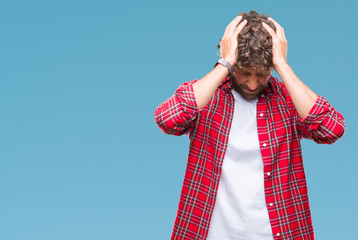 Sticker - Handsome hispanic model man over isolated background suffering from headache desperate and stressed because pain and migraine. Hands on head.