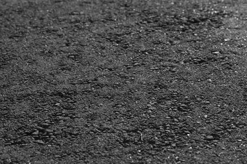 Asphalt background texture. New fresh asphalt black and white