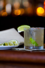 Drink and limes on bar and bokeh 2