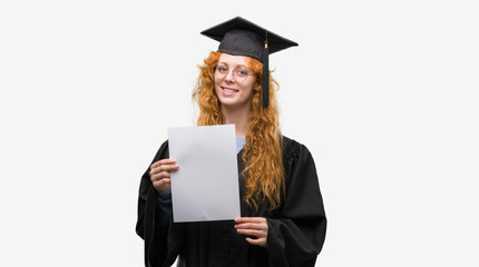 Sticker - Young redhead woman wearing graduate uniform holding degree with a happy face standing and smiling with a confident smile showing teeth