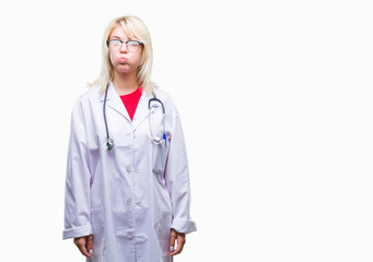 Poster - Young beautiful blonde doctor woman wearing medical uniform over isolated background puffing cheeks with funny face. Mouth inflated with air, crazy expression.