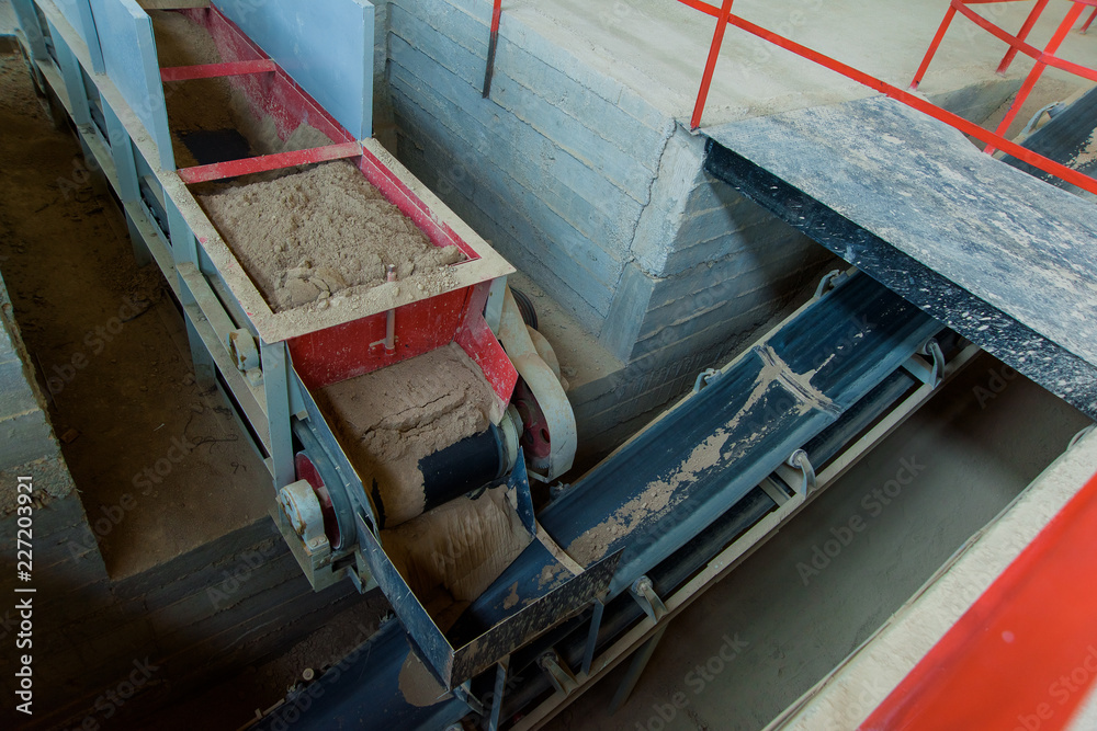 Conveyor at a brick factory. Conveyor belt for conveyors. Loading tape ...