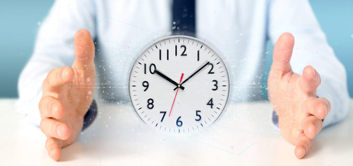 Poster - Man holding a clock timer 3d rendering
