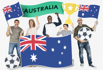 Diverse football fans holding the flag of Australia