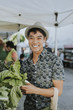© Rawpixel.com - Man buying kale at a farmers market