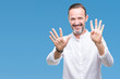© Krakenimages.com - Middle age hoary senior man over isolated background showing and pointing up with fingers number nine while smiling confident and happy.