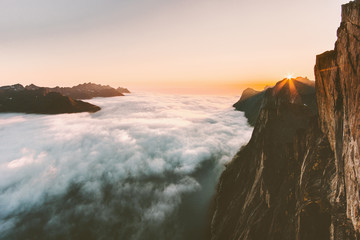 Wall Mural - Sunset mountains over sea with clouds landscape aerial view in Norway Travel  locations breathtaking tranquil scenery Senja islands