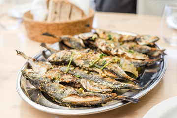 Wall Mural - Silver tray full of delicious fish mackerel known as carapau in Portugal