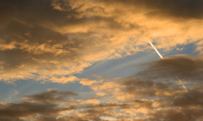 Wall Mural - Clouds at sunset.