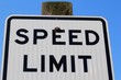 A view of the top of a speed limit sign on a close view.