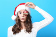 © 5second - Beautiful girl with christmas bauble on blue background