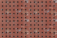 Perforated Metal Background. Red Steel Plate And Punching.