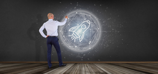 Poster - Businessman in front of a  start up rocket on a sphere 3d rendering