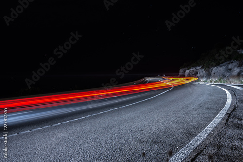 Fotografía fotografia nocturna de carretera circulando coches