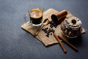 coffee with seed and traditional copper on wooden