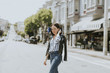 © Rawpixel.com - Casual woman crossing the street in downtown, San Francisco