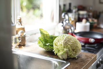 Poster - Freshly washed cabbage on a kitchen counter
